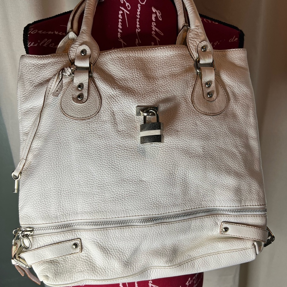 Laura DiMaggio white pebble grain leather bag